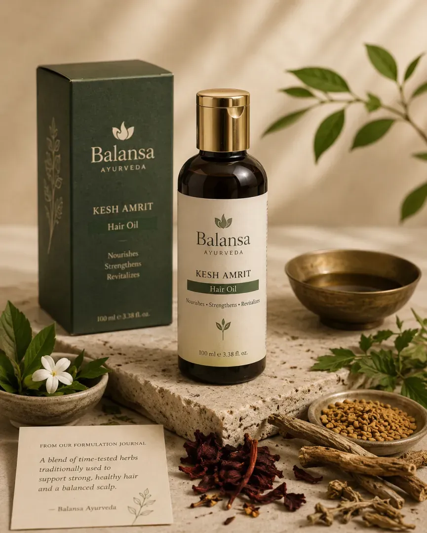 Bottle of Balansa Ayurveda Kesh Amrit hair oil with bhringraj and hibiscus for stronger hair and a calm scalp